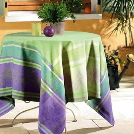 A small table with a colorful covering