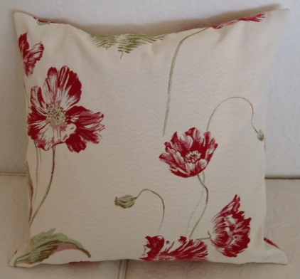 Red floral designs on fabric