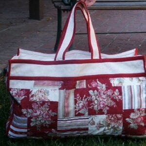 A red bag with floral designs