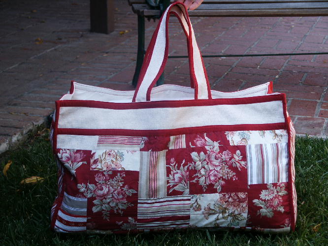 A red bag with floral designs