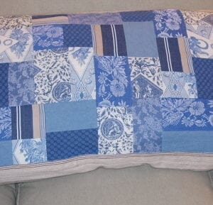 A pillow case with blue patterns