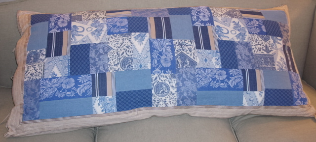 A pillow case with blue patterns