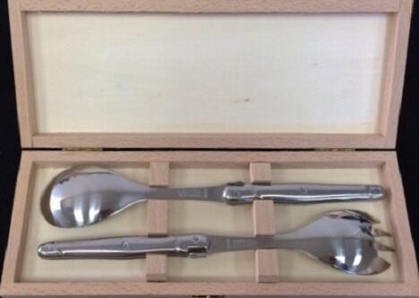 Metal table utensils in a box