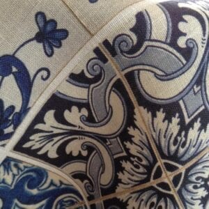 A blue floral and line patterns on fabric