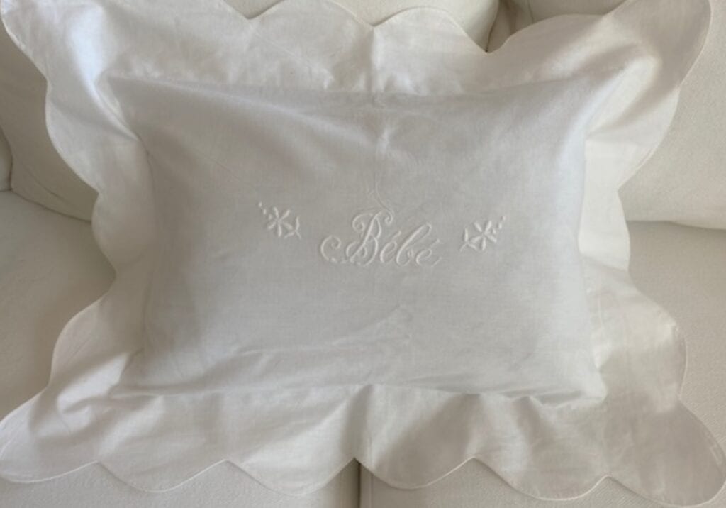 A white pillow case design with two flowers