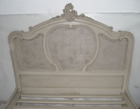 A white carved woodwork for the couch