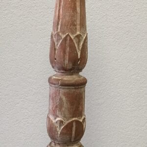 A brown lamp base sconce