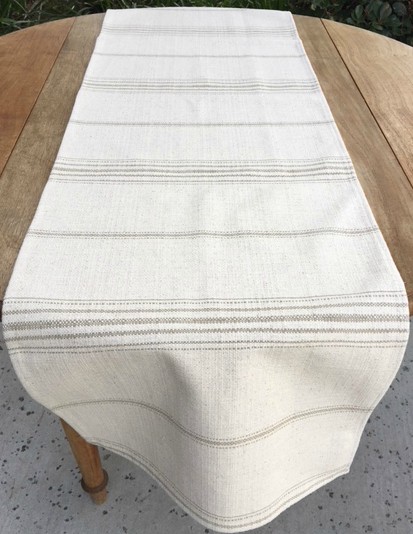 A white cloth with grey stripes