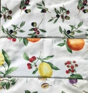 Four placemats with fruit patterns