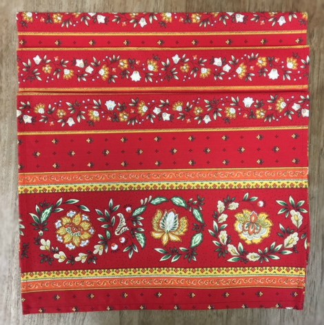 Red placemats with floral designs