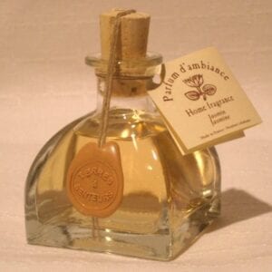 A bottle of yellow perfume
