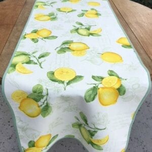 A white cloth with sliced lemon patterns
