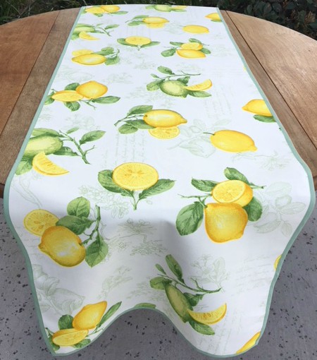 A white cloth with sliced lemon patterns