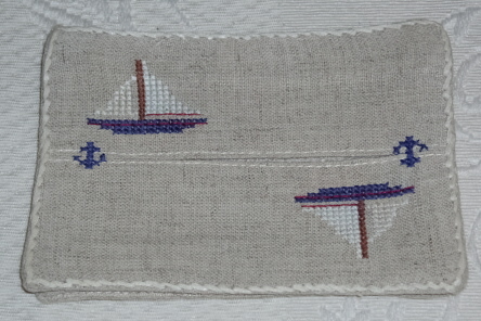 Ships embroidered into the pattern