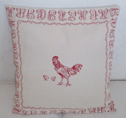 A pillow case with red chicken designs