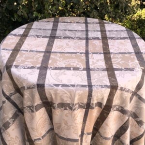 A pattern of cream and brown on a table cloth