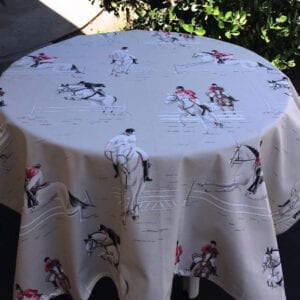 A table cloth with equestrian patterns