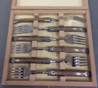 Six forks with wooden handles