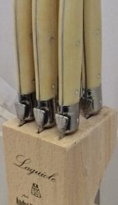 A Set of Six Cream Handel Knives With Knife Holder