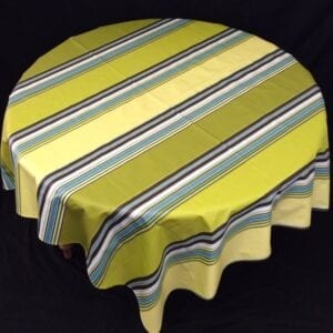 A yellow table cloth with blue patterns