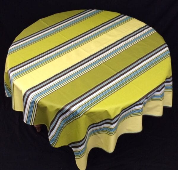 A yellow table cloth with blue patterns