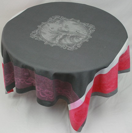 A dark grey table cloth with dark pink patterns