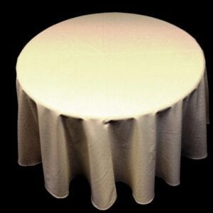 A white table cloth under bright yellow lighting