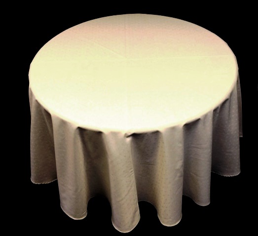A white table cloth under bright yellow lighting