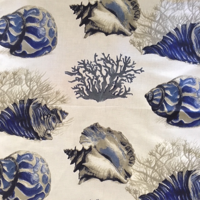 Blue shells and corals on fabric