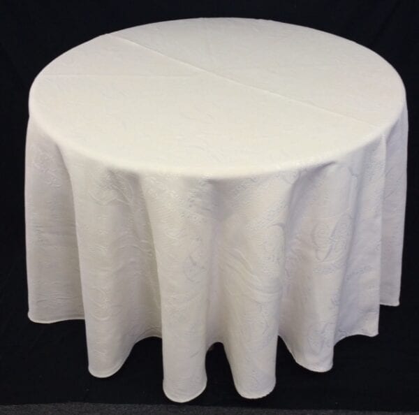 A large white table cloth with patterns
