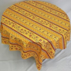 An orange and yellow table cloth with patterns