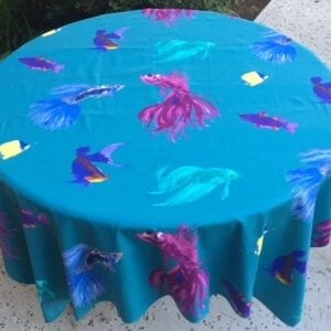 A blue table cloth with fish designs