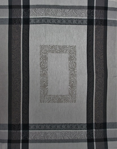 A white tea towel with black and grey patterns