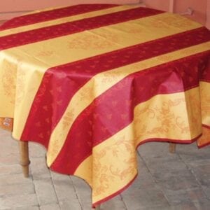 A pattern red and yellow striped table cloth