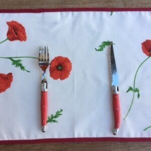 A placemat with poppy designs