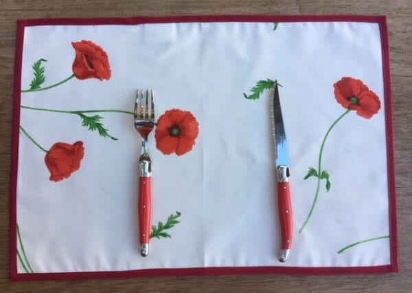 A placemat with poppy designs