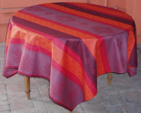 A pattern of orange, pink, and purple table cloth
