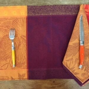 A purple and orange placemat