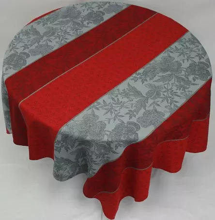 A grey and red table cloth with patterns
