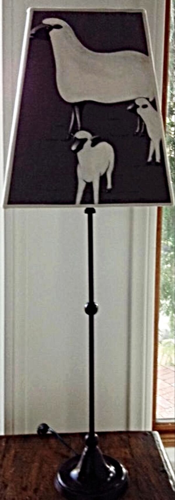 A sheep designed shade for the lamp